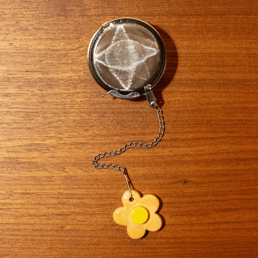 Infusor de Aco Inox Corrente Berloque Flor Laranja